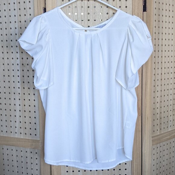 IRIS top with statement sleeves, round neck, short sleeves,  pearl button - Picture 1 of 11